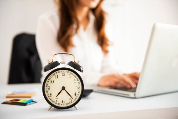 istock Office Business woman working overtime 1054009304