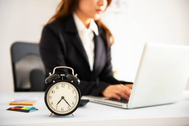 istock Office Business woman working overtime 1054009344