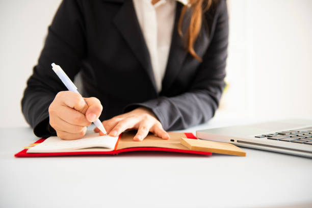 istock asian Business woman working in office 1054009356