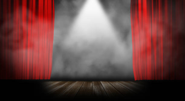 istock Red stage curtain with smoke background 1054009730