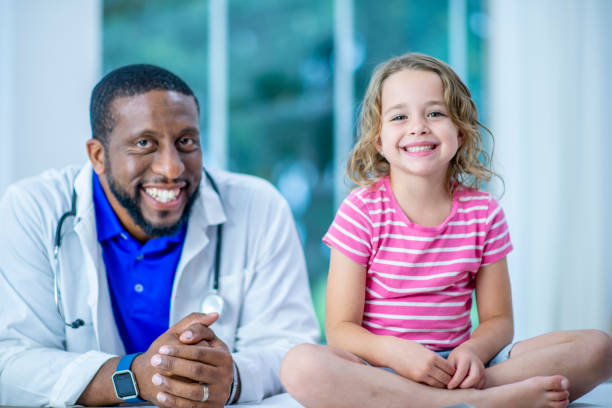 istock Doctor and cute patient smile for the camera 1054016582