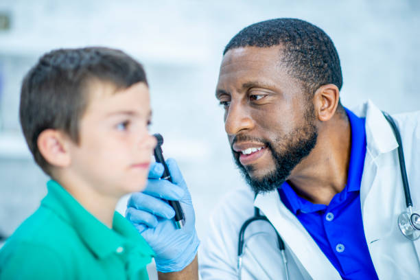 istock Kid gets a check up at the doctor's 1054016602