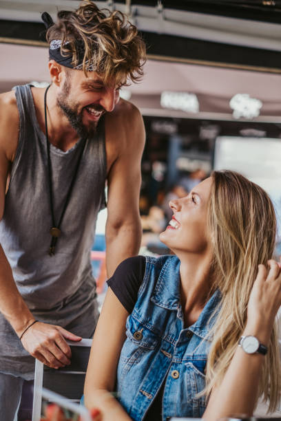 istock Man surprised his girlfriend in a cafe 1054018442