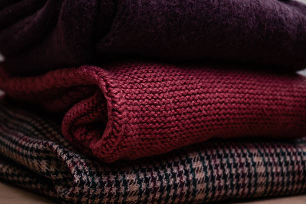 istock Pile of winter clothes. 1054018820