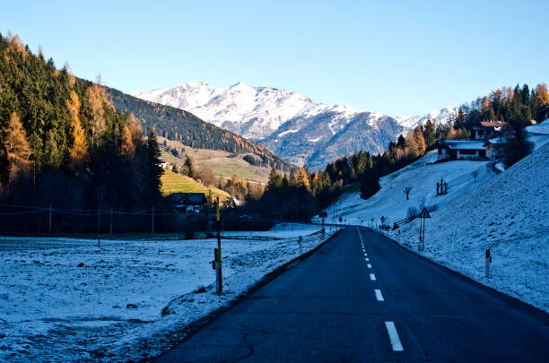 istock snowy road leads to the highest mountains 1054018940