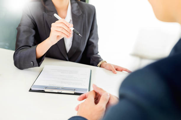 istock Midsection Of Business Colleagues Working In Office 1054030612