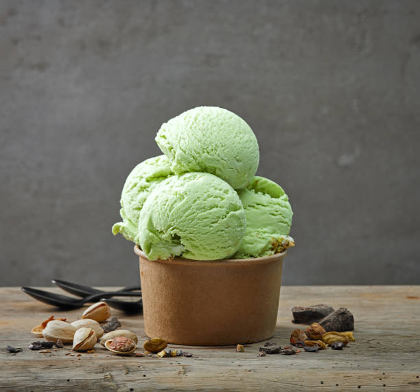 istock paper cup of pistachio ice cream 1054032232