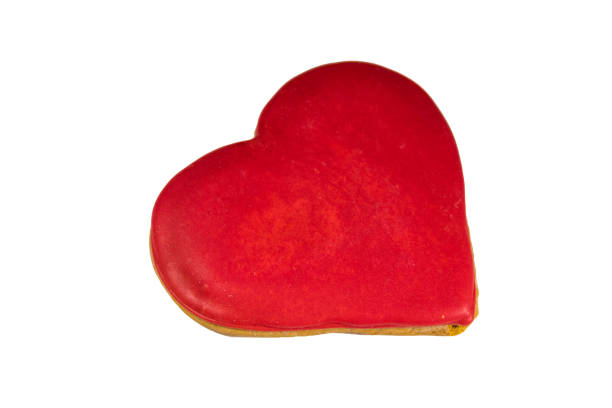 istock Heart shaped gingerbread cookie isolated on white background 1054060956
