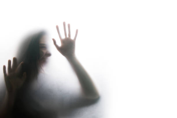 Person shadows on Frosted glass