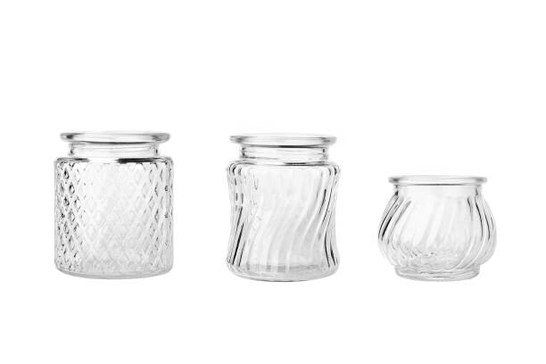 Set of three glass vases isolated on white background.