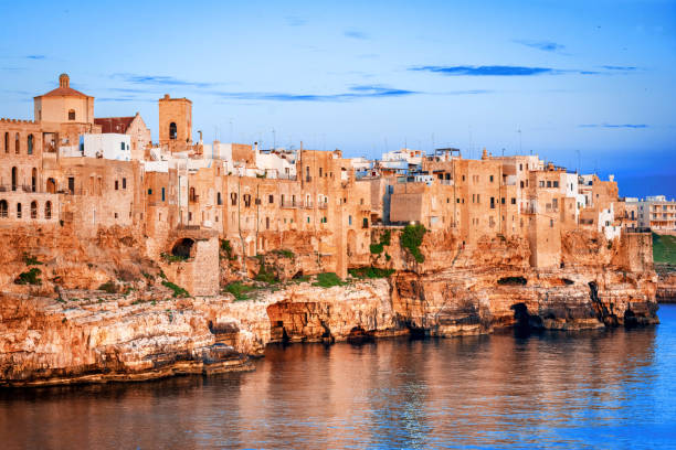 istock Polignano a Mare, Puglia, Italy, Sunset view 1054068680
