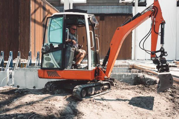 istock Dumper truck and bulldozer working 1054076750