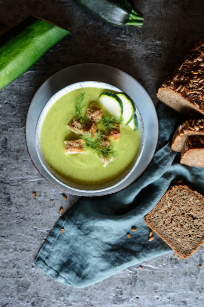 istock Creamy zucchini soup with croutons 1054080178