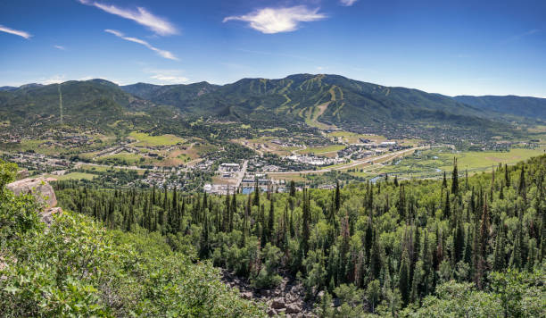 Steamboat Springs Panorama Panoramic view of the ski resort town of Steamboat Springs Colorado in the summer steamboat springs stock pictures, royalty-free photos & images