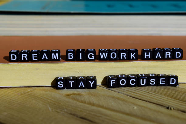 istock Dream big work hard stay focused on wooden blocks 1054085312