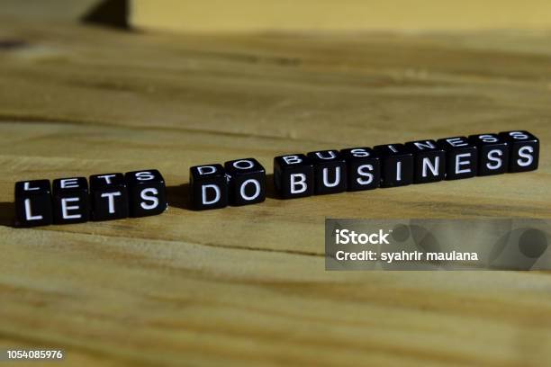 Lets Do Business On Wooden Blocks Stock Photo - Download Image Now - Beginnings, Achievement, Advice