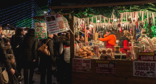 famous wooden cabins or traders sell handicrafts on christmas markets - belfort imagens e fotografias de stock