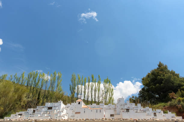 The whitewashed buildings of Zahara de la Sierra stand out perched on the mountain in this 'pueblo blanco', one of the white towns in Andalusia