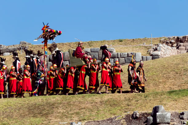 Inti Raymi Ceremony Peru South America Inca Costumes Cusco, Peru - June 24, 2015: Men Dressed In Traditional Inca Costumes For Inti Raymi Ceremony King Being Carried Into Festival On Golden Throne inti raymi stock pictures, royalty-free photos & images