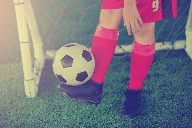 istock Asian soccer player bounce the ball 1054126208