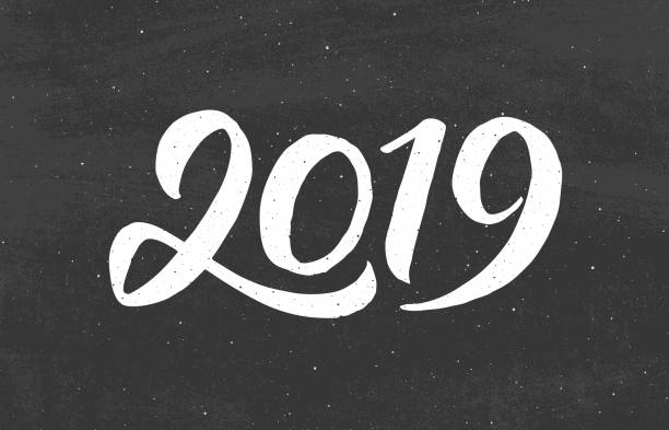 istock Happy New Year 2019 greeting card design with typography text on black chalkboard background. Vintage vector illustration with hand drawn lettering for Chinese Year of the Pig. 1054137614