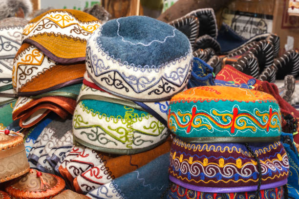 istock Traditional Asian headdresses from a multicolored felt with an embroidered colored thread of national ornament. 1054146404