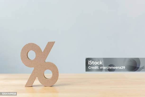 Percentage Sign Symbol Icon Wooden On Wood Table With White Background Stock Photo - Download Image Now