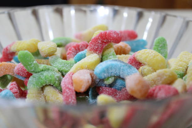 istock Close-up of gummy worm candy in a serving bowl 1054155928