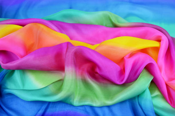 istock Texture of natural silk fabric multi color for backgrounds 1054180680
