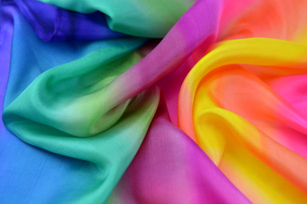 istock Texture of natural silk fabric multi color for backgrounds 1054180742