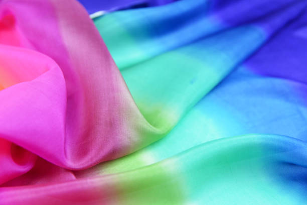istock Texture of natural silk fabric multi color for backgrounds 1054180754