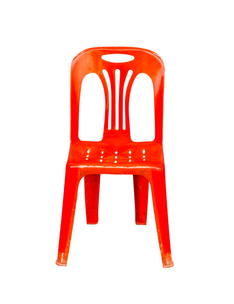 istock Red plastic chair on white floor. 1054187750