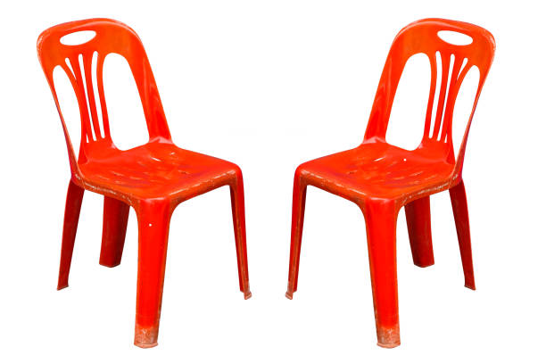 istock Red plastic chair on white floor. 1054188450