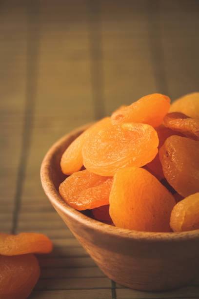 istock Dried apricots in the bowl 1054208878