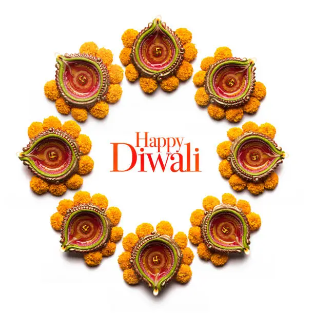 happy Diwali Rangoli made using Diya and flowers, Season's greeting card
