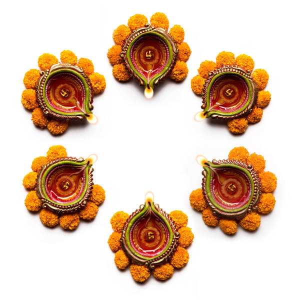 happy Diwali Rangoli made using Diya and flowers, Season's greeting card