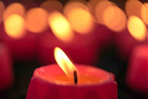 istock Flower candles burning at night. 1054228652