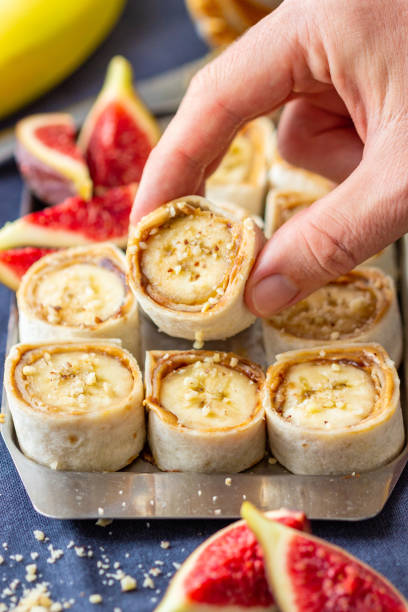 istock Banana Sushi with Peanut Butter 1054238346
