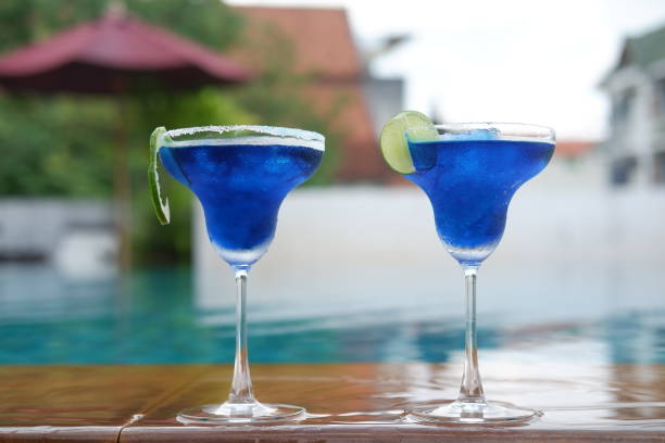 istock margarita cocktail at swimming pool 1054244414