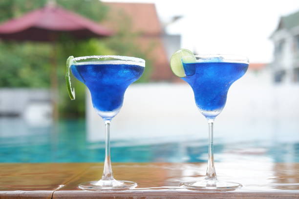 istock margarita cocktail at swimming pool 1054244418