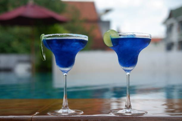 istock margarita cocktail at swimming pool 1054244430