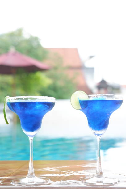 istock margarita cocktail at swimming pool 1054244476