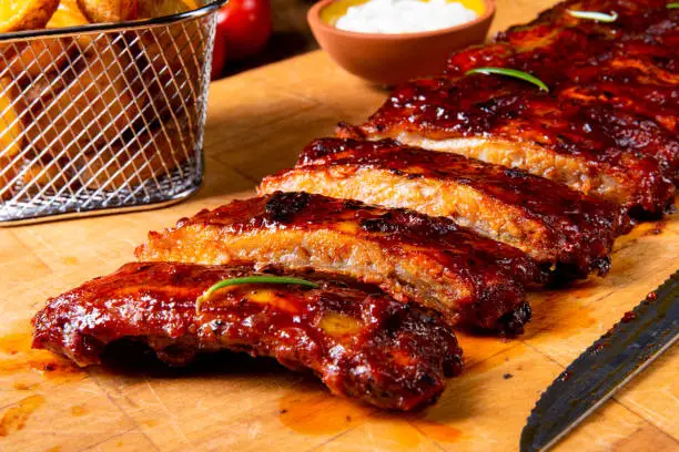BBQ spare ribs from a charcoal grill