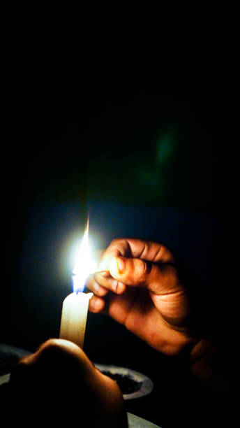 istock Candles lit in the dark 1054252456