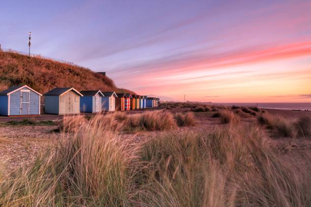 istock Beach huts early in the morning 1054253812