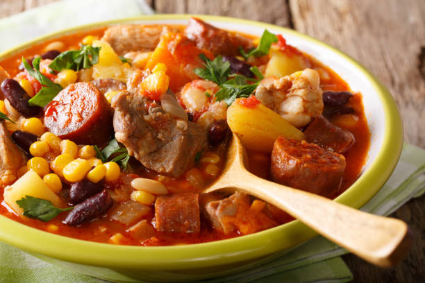 istock National dish Cape Verde - Cachupa stew with meat and vegetables close-up. horizontal 1054255812