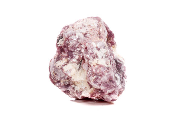 istock Macro mineral stone Lepidolite in the rock a white background 1054260720