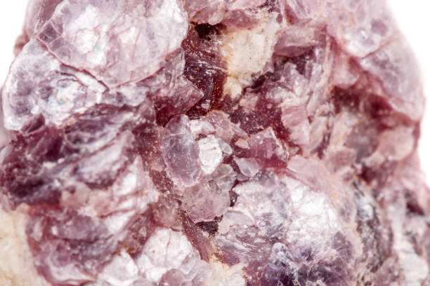 istock Macro mineral stone Lepidolite in the rock a white background 1054261012