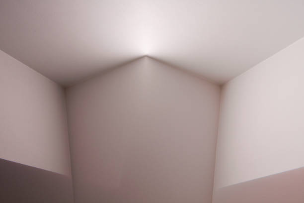 istock Computer graphic image of walls and ceiling. Polygonal structure of corners / angular shapes. Abstract background on the subject of modern architecture or interior. 1054261218