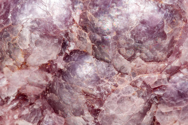 Macro mineral stone Lepidolite in the rock a white background